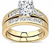 Yellow Gold Setting With Princess Sidestones And Matching Band